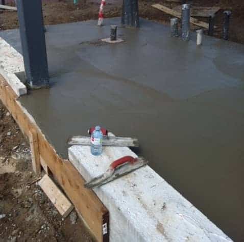 Poured concrete slab being finished