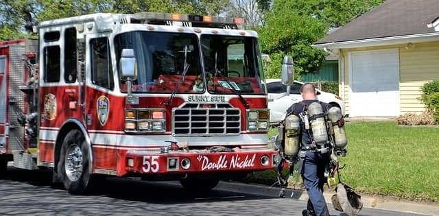 Fire Fighter walking back to the fire truck